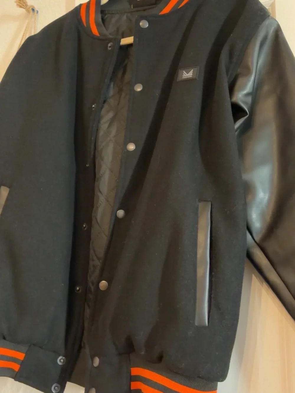 Black Varsity Jacket with Orange Stripe Trim